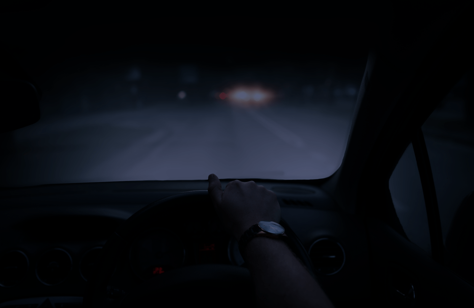 Driving down a dark road, a private investigator is on their way to investigate a case