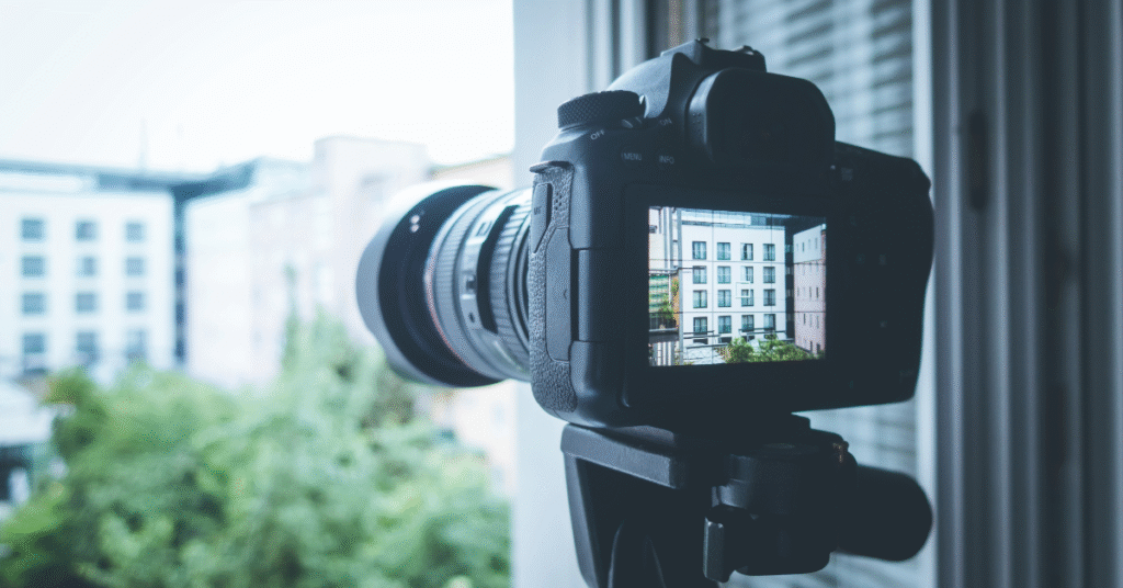 A DSLR camera on a stand set to take a photographj